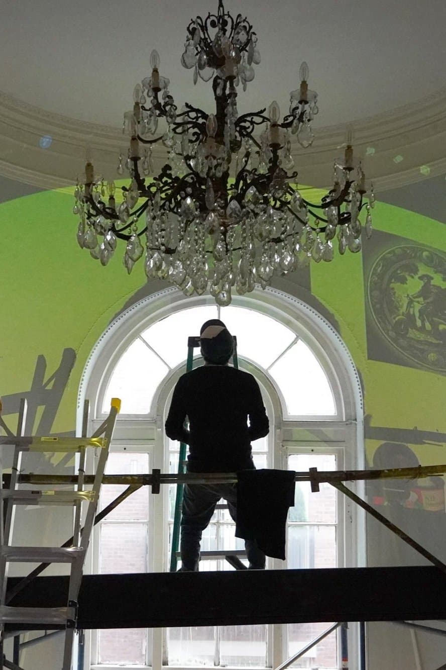 Artist Ozmo working at his artwork. Photo credits: Studio d'Arte Raffaelli