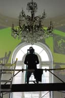 Artist Ozmo working at his artwork. Photo credits: Studio d'Arte Raffaelli